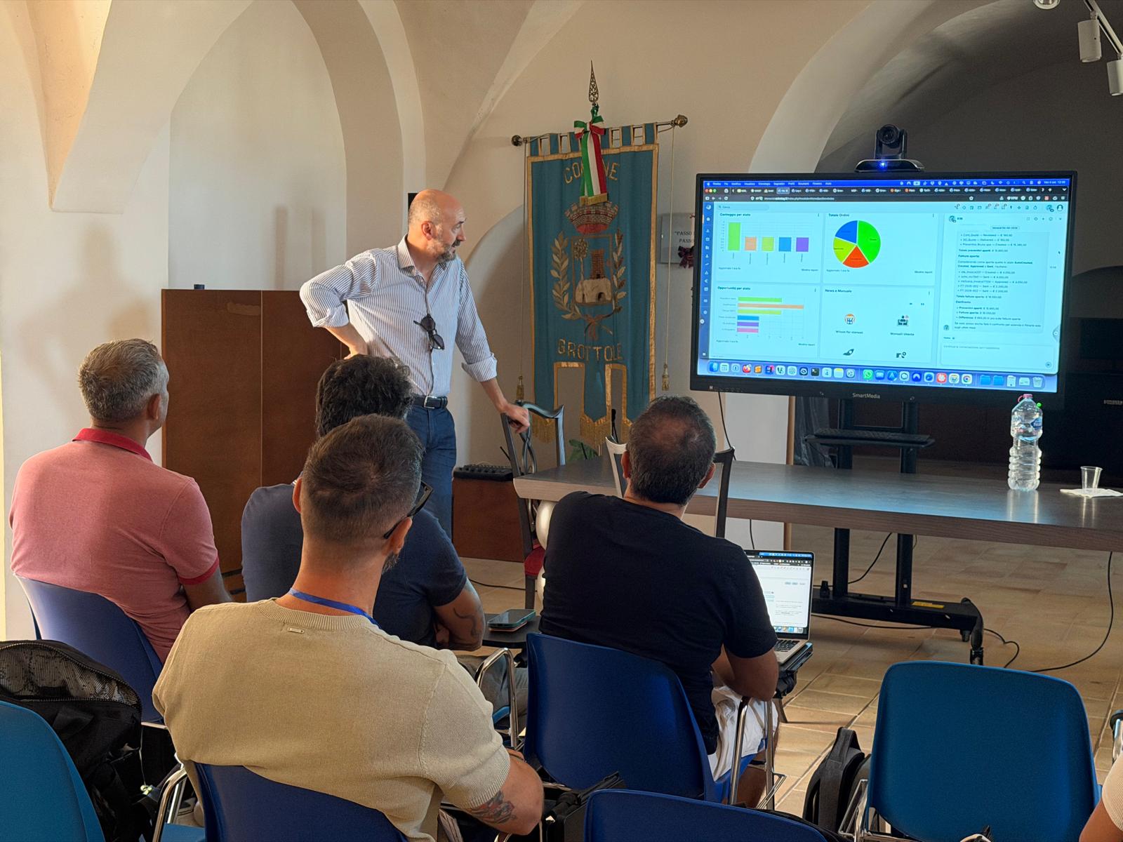 Partecipanti concentrati durante una presentazione dell’Academy