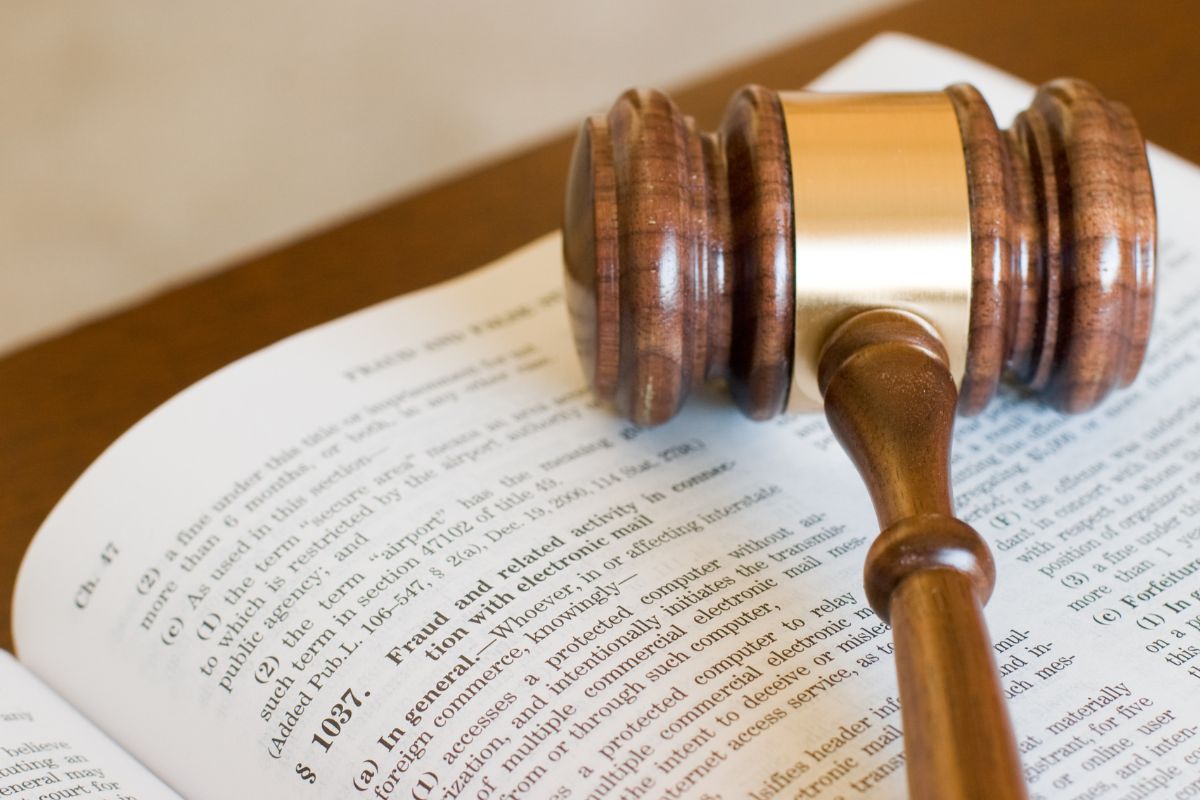 Law gavel on a white page