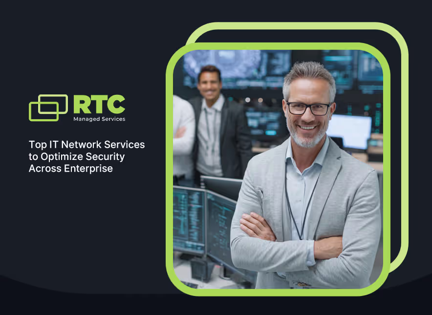 RTC Managed Services team of IT professionals smiling in a network operations center with multiple monitors