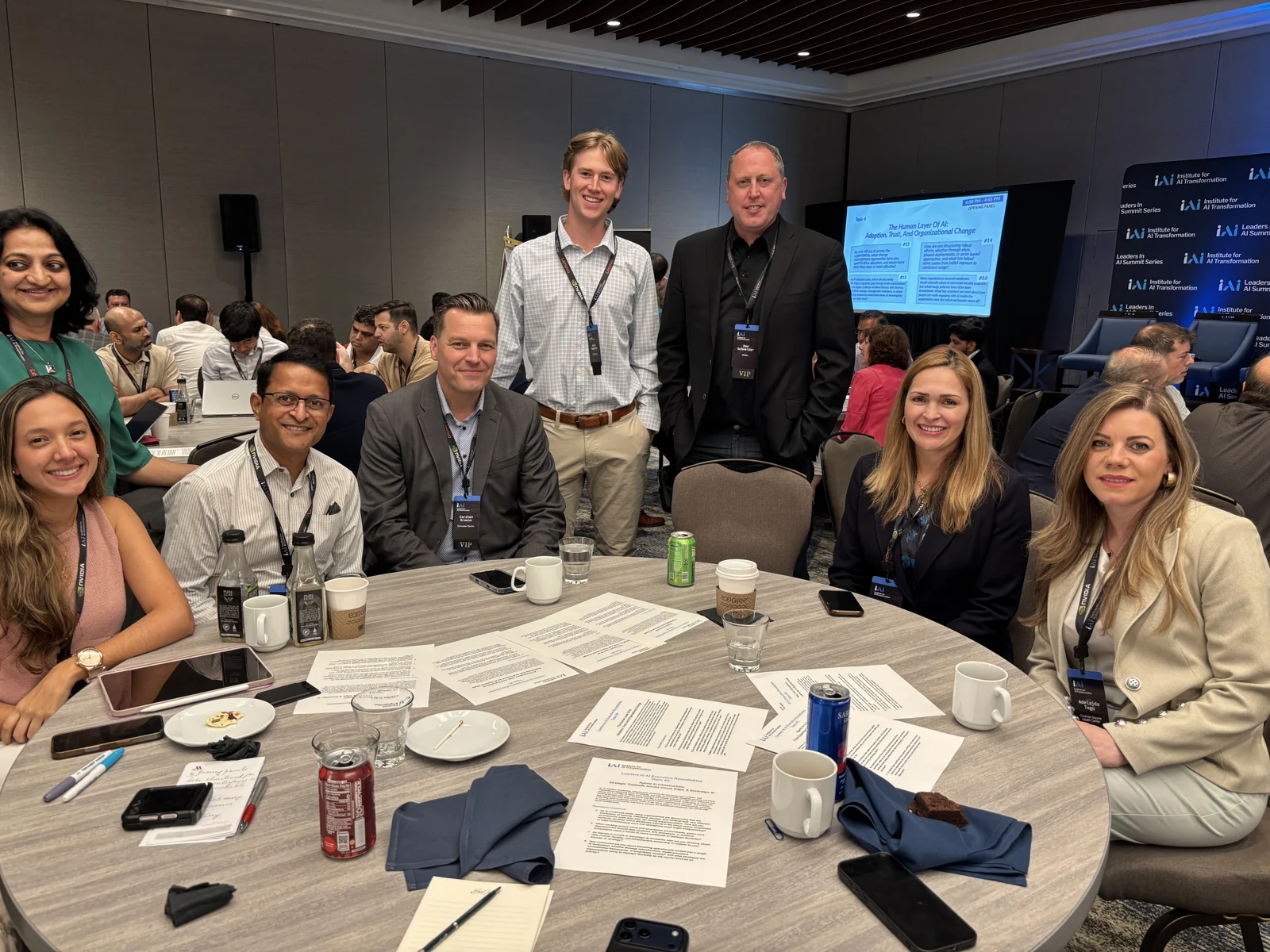 Executives gathered at a table during the Boston 2026 summit