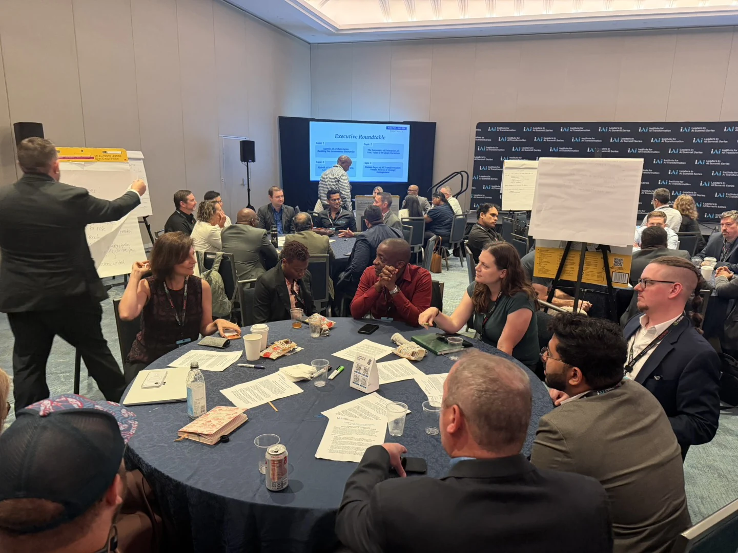 Executives working through questions around tables at the Nashville 2026 summit