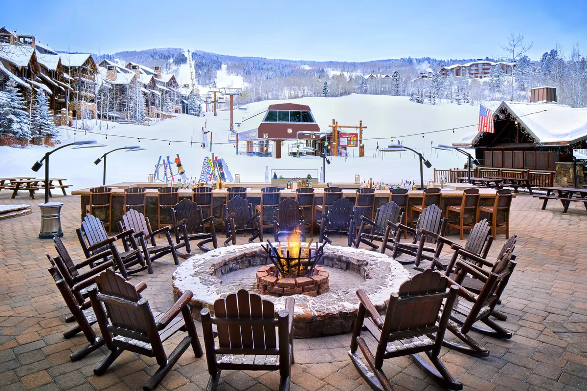 The Ritz-Carlton Bachelor Gulch firepit and snowy mountain setting