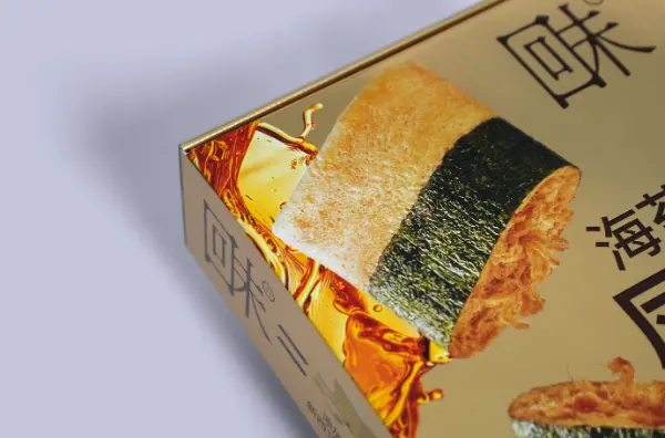 Close-up view of the embossed UV printing details on a food-grade cake roll corrugated mailer box