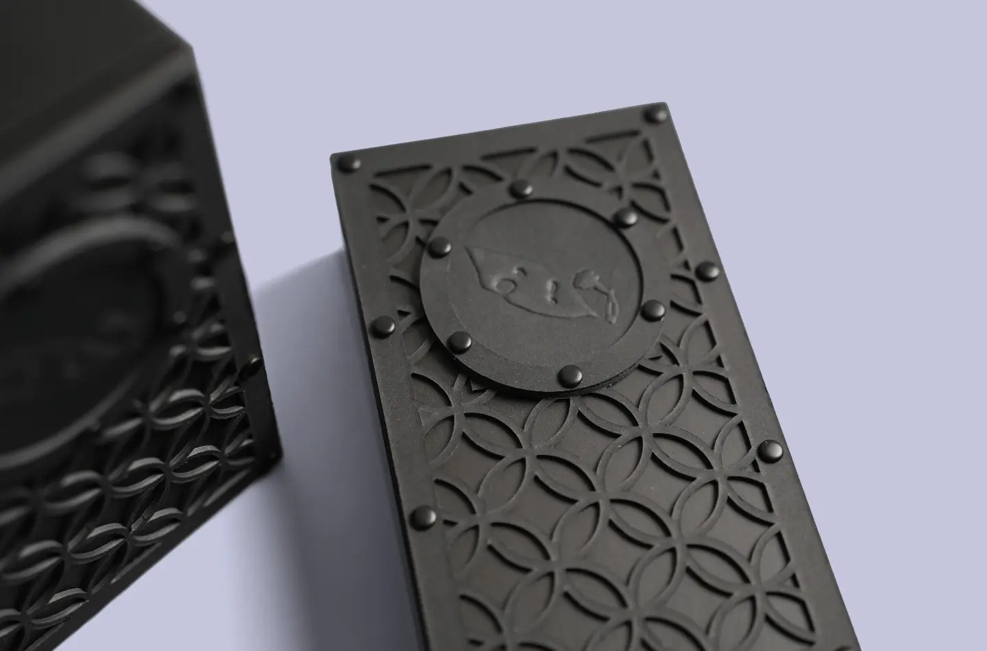 Customized tea industry telescopic lid box with black exterior and red interior, top view highlighting plastic component details