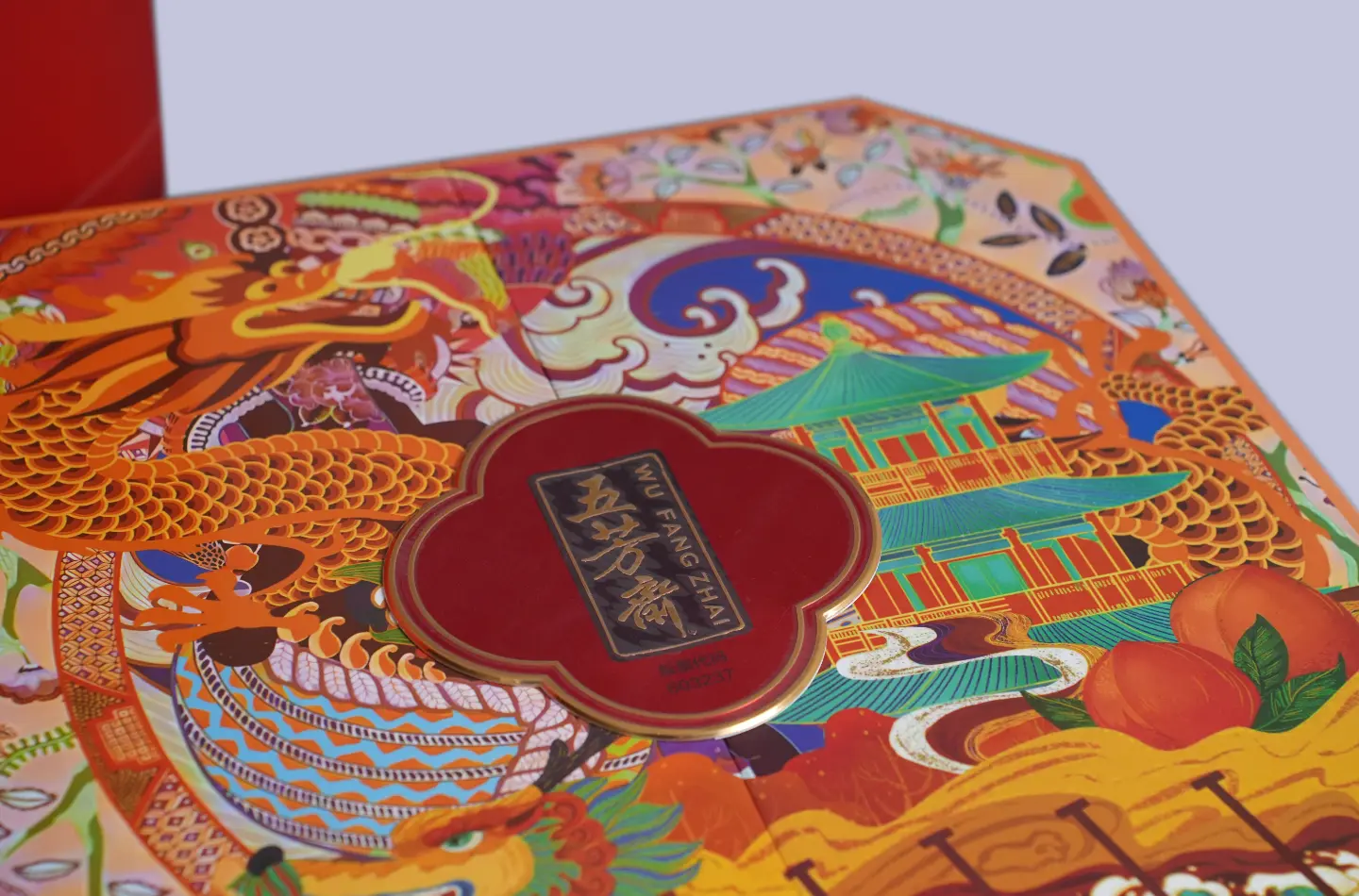 Customized magnetic closure rigid gift box paired with gift bag, displayed open with internal tray revealing structure from the front