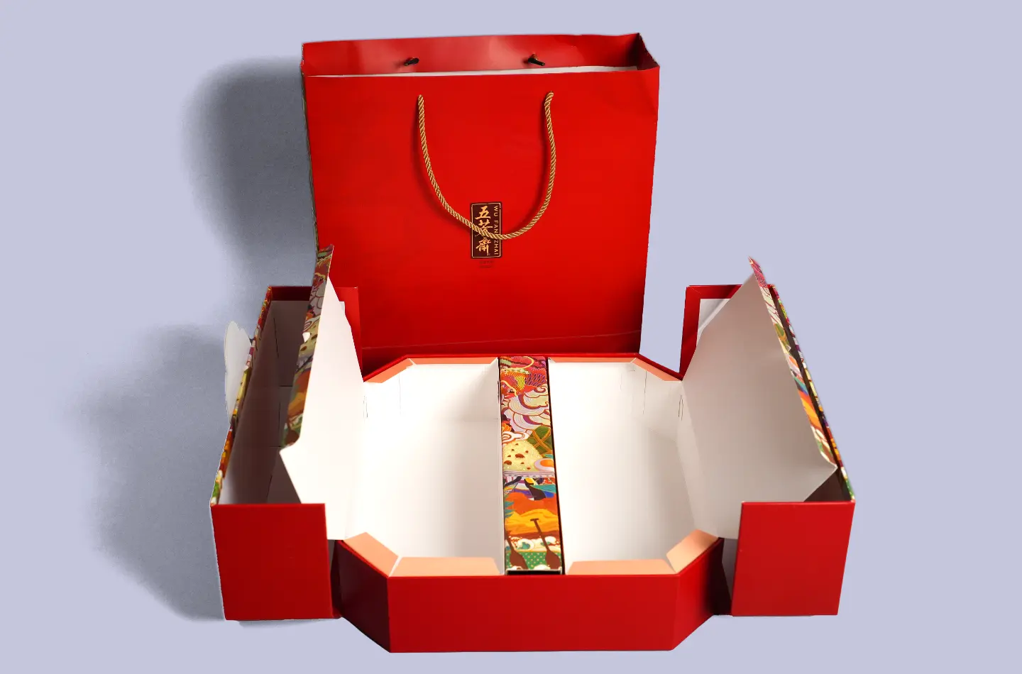 Front-facing view of a custom magnetic rigid gift box and matching gift bag, lid opened to display interior tray and structural details