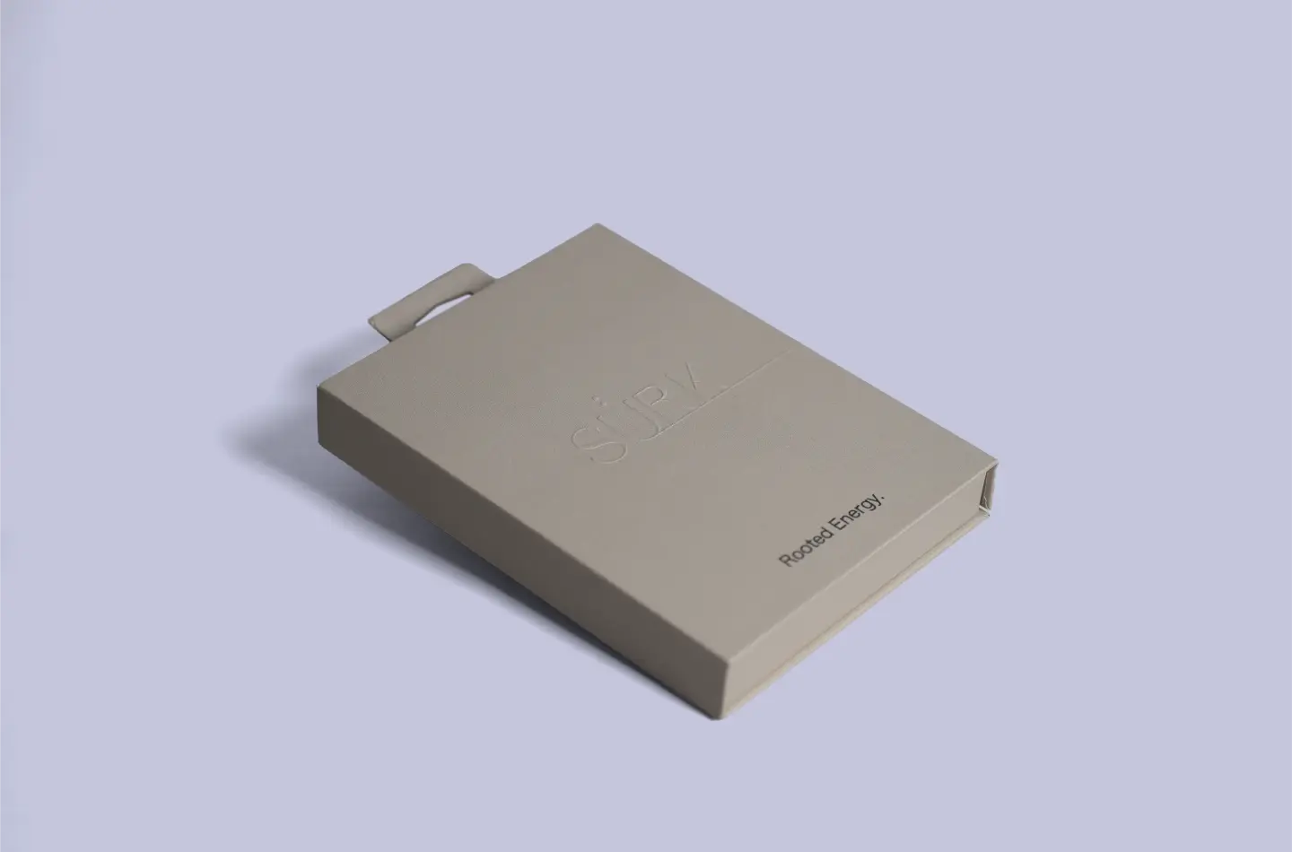 Custom magnetic flip lid box for clothing industry with hook and embossed finish, displayed from the front