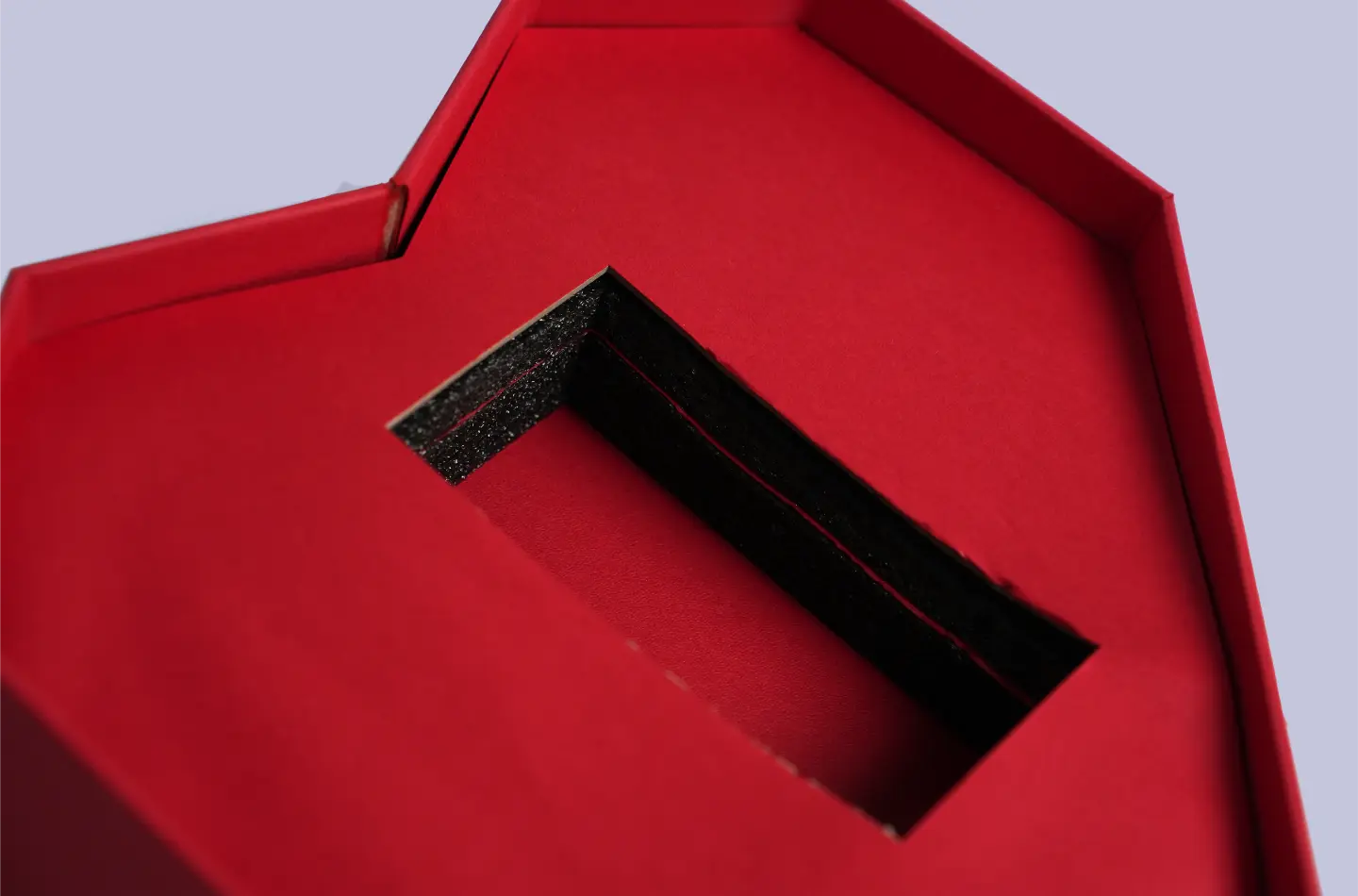 Custom red heart-shaped telescopic box displayed open, revealing inner foam insert