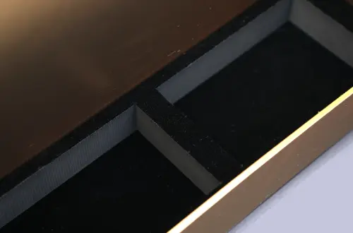 Detail shot of the internal EVA lining in a gold magnetic flip-cover drawer box