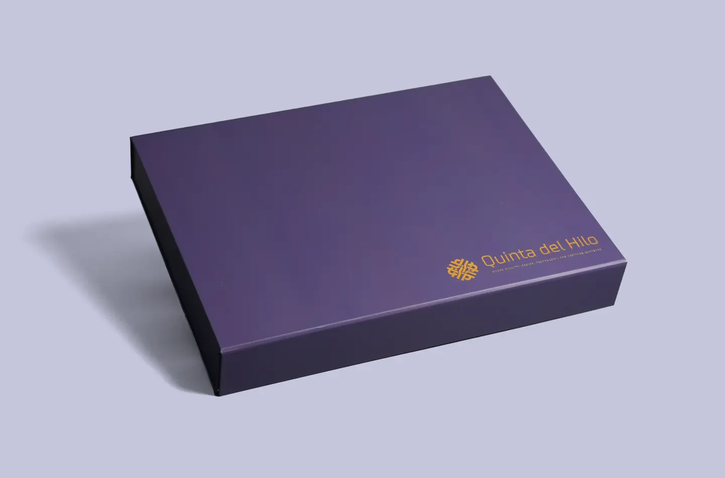 Custom flip-top folding packaging box with gold-foil surface shown from the front