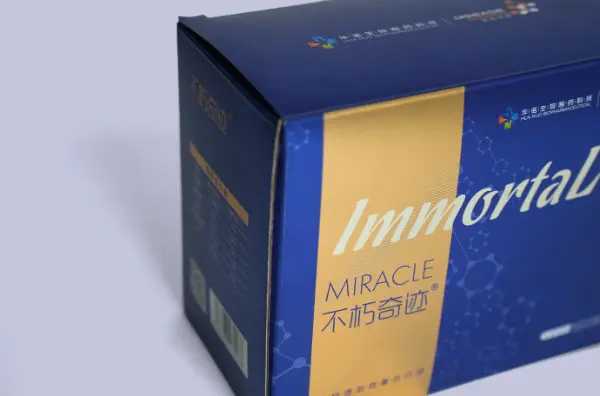 Side view detail showing silver stamping on a corrugated tuck box for nutraceutical packaging