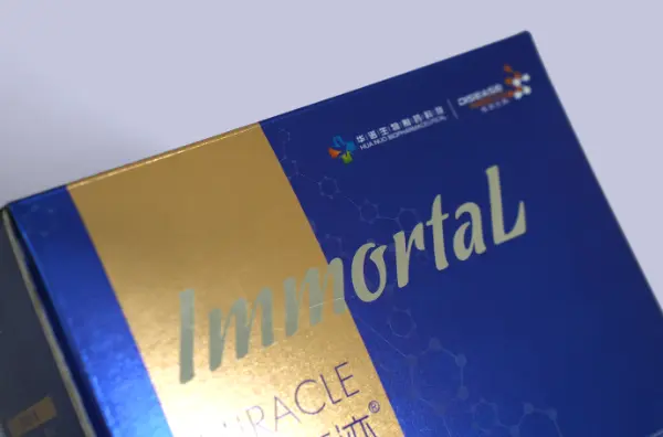 Detail shot showing silver foil accents on the side of a nutraceutical corrugated tuck box