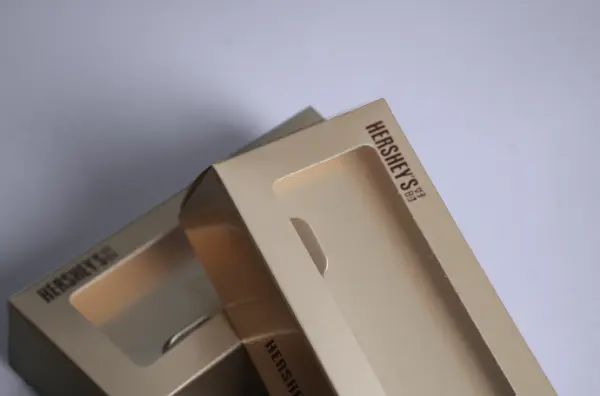 Close-up of the clear window feature on a custom chocolate packaging tuck-end cardstock box