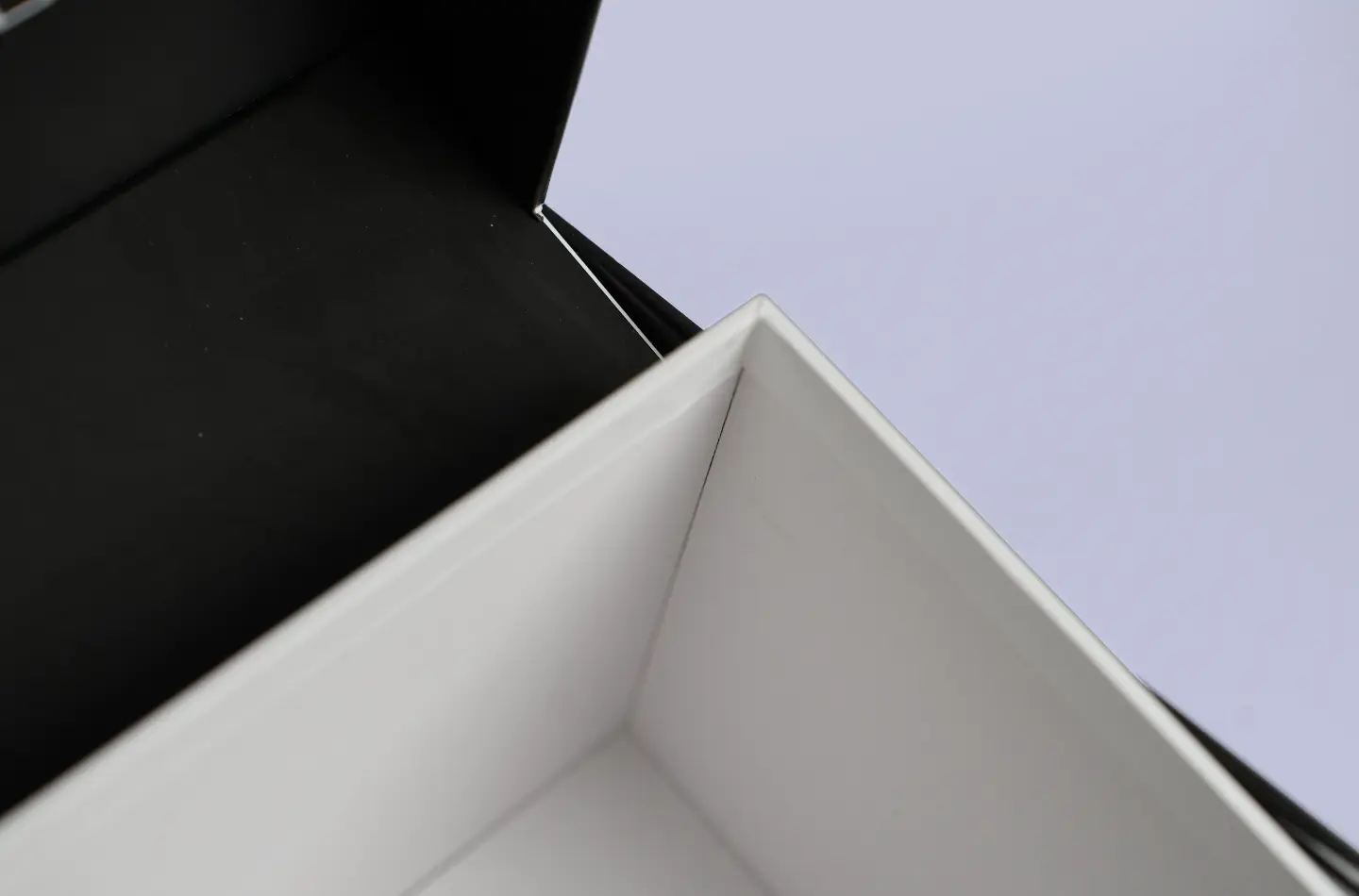 Close-up of the internal structure of the open custom flip-top display box for toy packaging