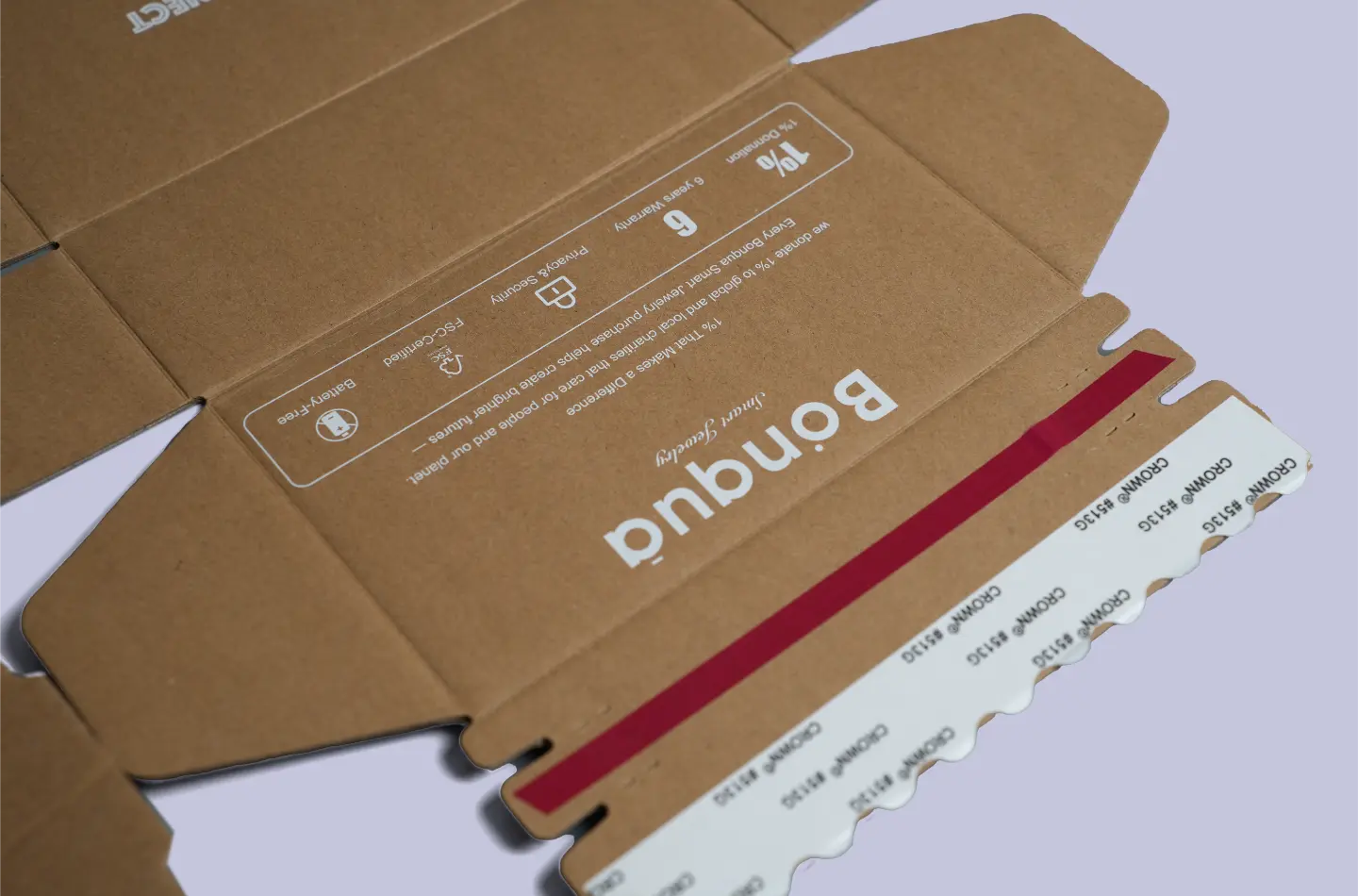 Detailed view showing the tear strip feature on a custom corrugated packaging tuck box