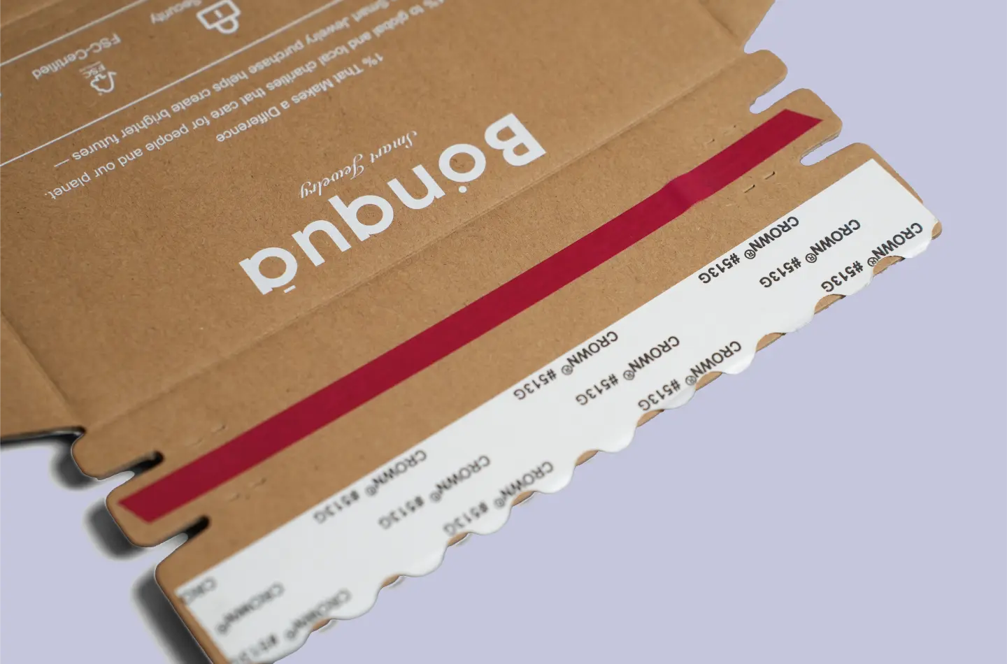 Close-up of the tear strip on a custom corrugated tuck-end box