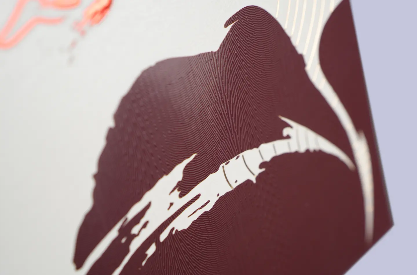 Macro shot highlighting the intricate embossed texture and refined surface finish of the luxury red-gold hot foil window tuck box