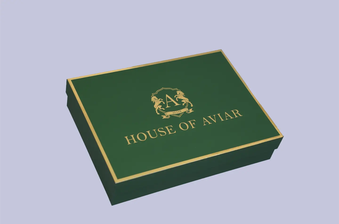 Premium green lid-and-base gift box with metallic gold foil stamping, front-facing product display.