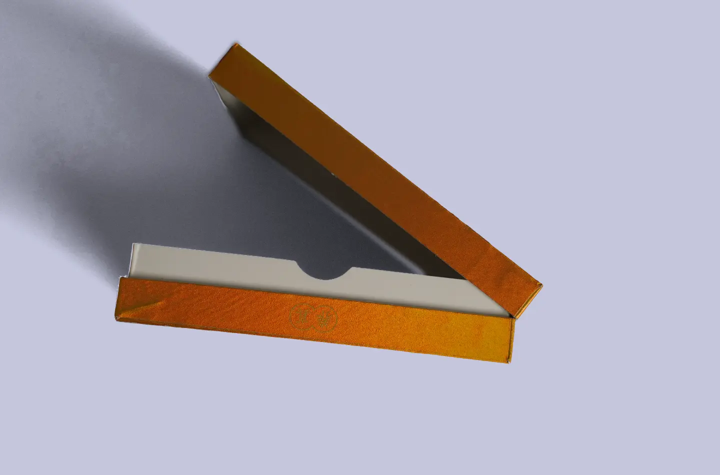 Detailed side view showing the opening of a high-end flip-top paperboard box with embossed texture and laminated gold foil