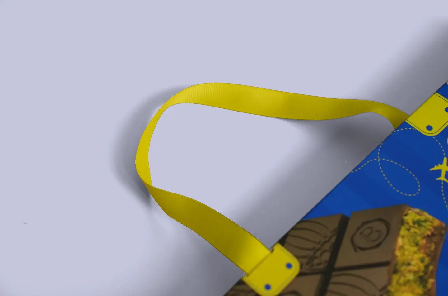 Custom paperboard box with tuck-in flap, close-up showing handle features