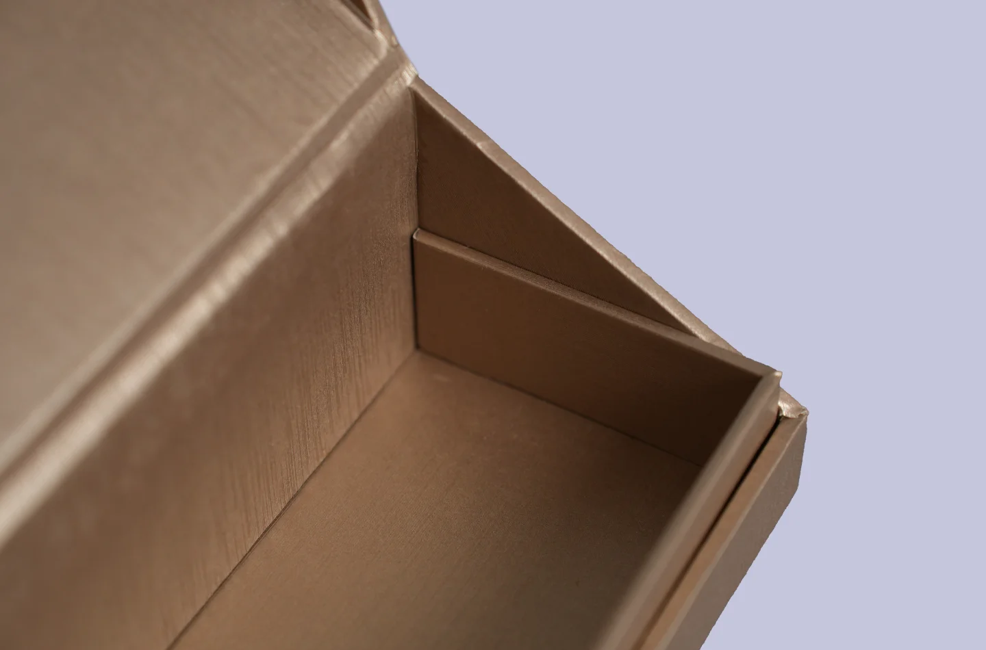 custom brown flip lid box laminated with special pearlescent paper for apparel packaging, interior detail view when opened