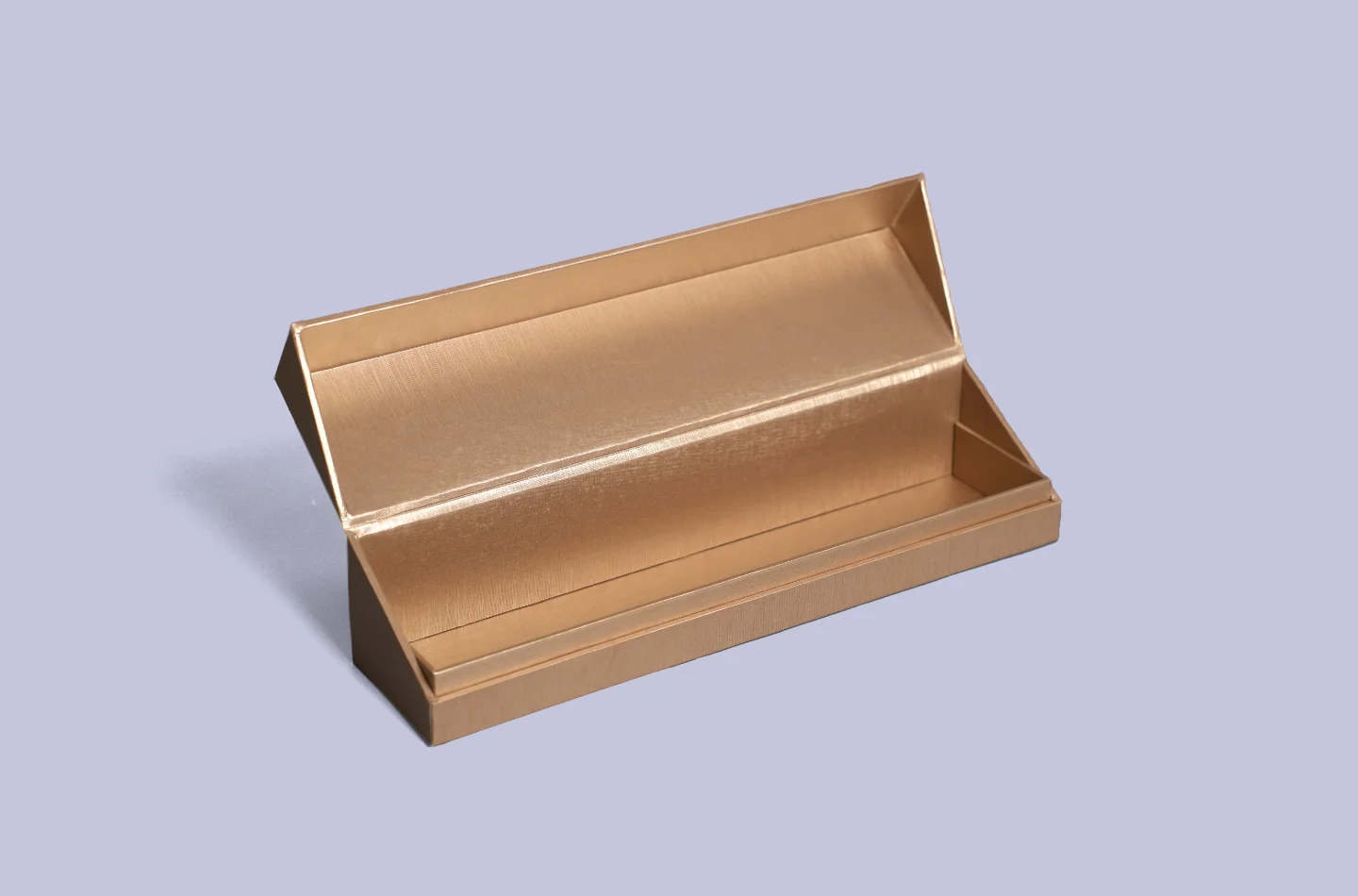 custom brown flip lid box featuring a specialty pearlescent paper laminated surface for apparel packaging, shown opened from the front highlighting details