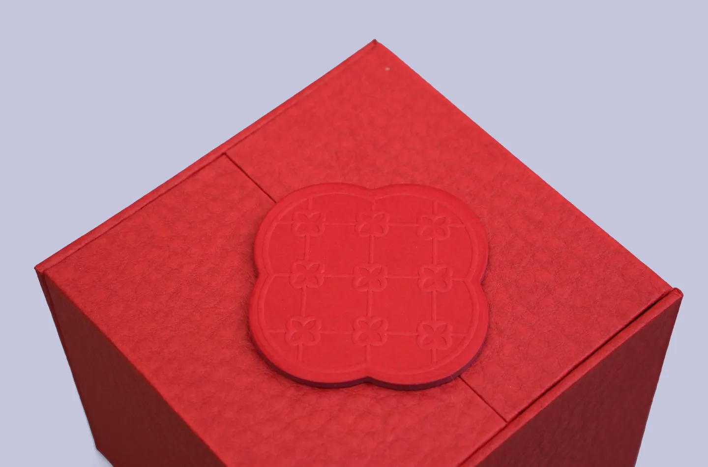 premium custom red magnetic double-door tea box featuring a die-cut paper insert, showing interior front detail