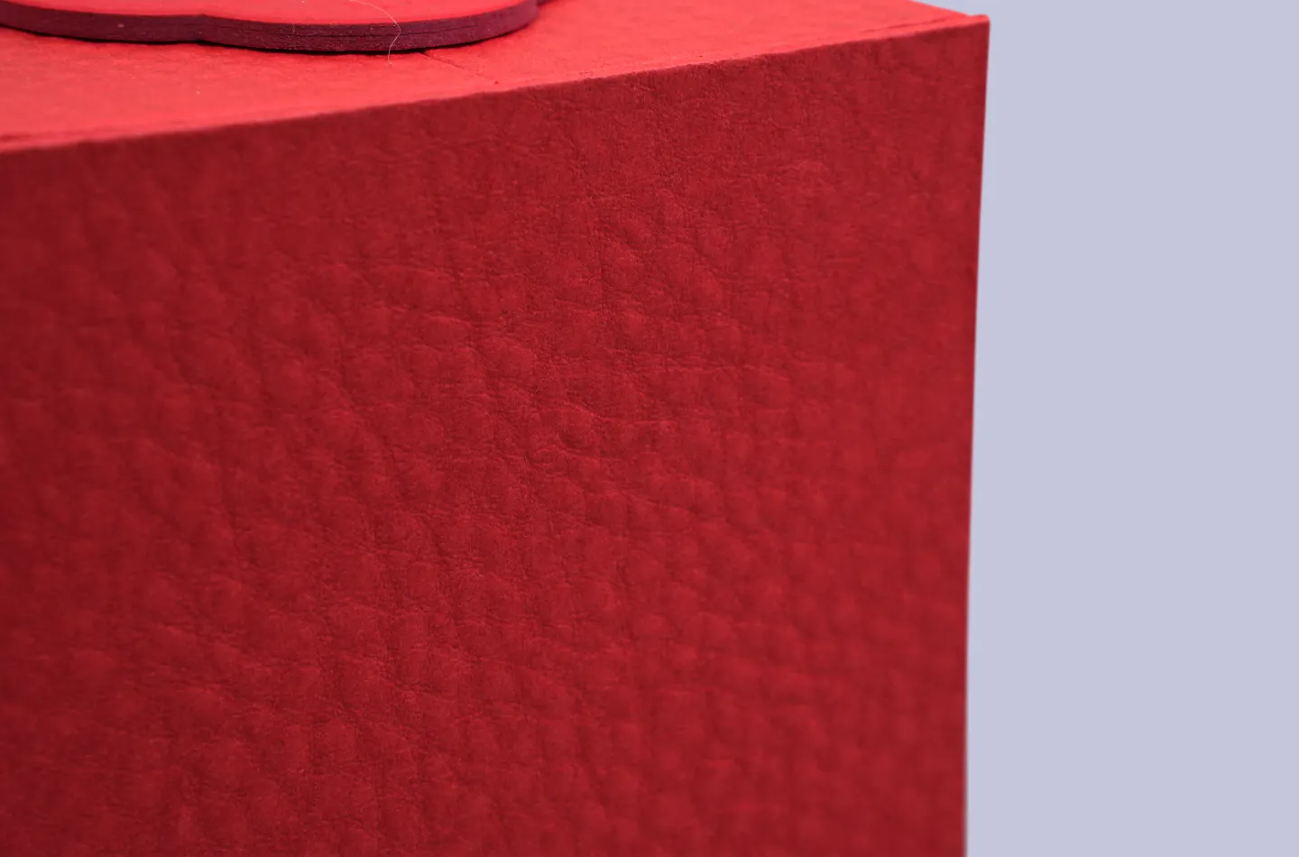 premium custom red magnetic double-door tea box featuring a die-cut paper insert, displayed open in a top view