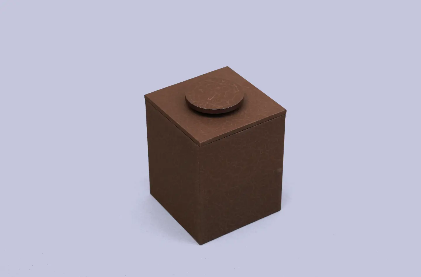 premium custom brown two-piece rigid tea box with specialty paper and handle, showcasing the front view