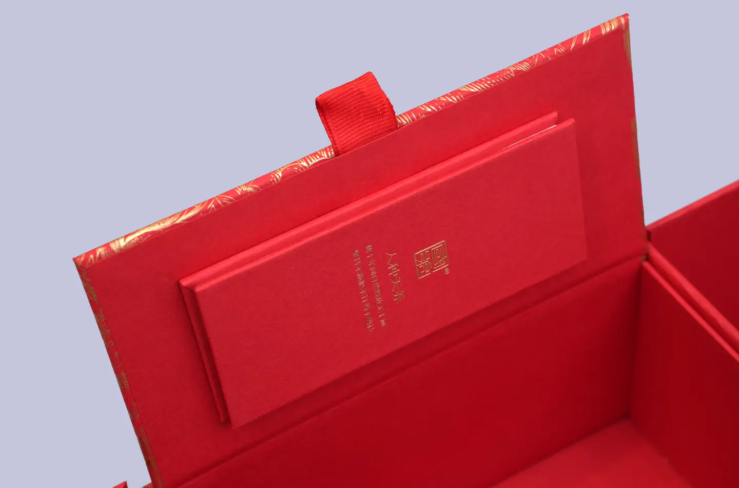 premium custom red tea magnetic book-style rigid box with specialty paper surface opened from the front view