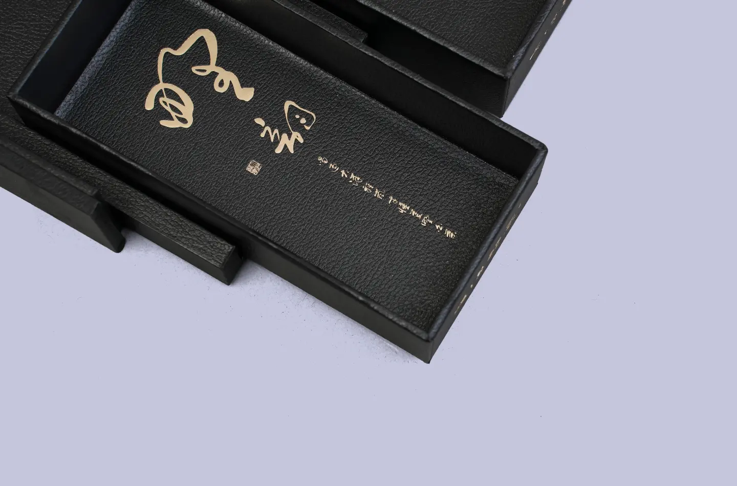 premium custom black tea magnetic book-style box featuring specialty paper surface showcasing the fully open front view with interior detail