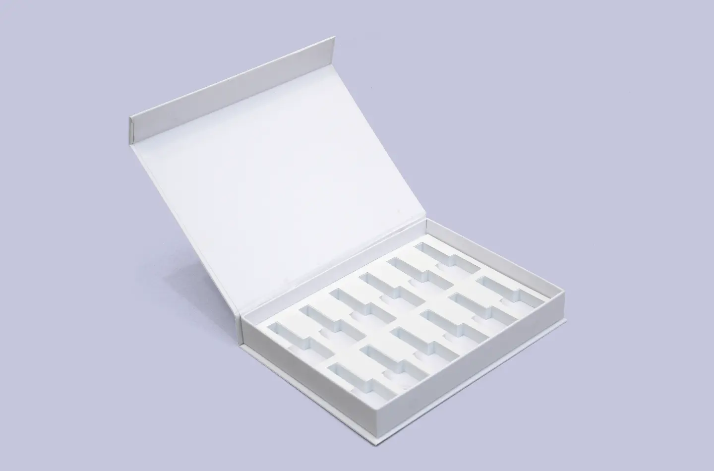 premium custom white cosmetics book-style box with EVA insert and pink logo fully opened from the front view