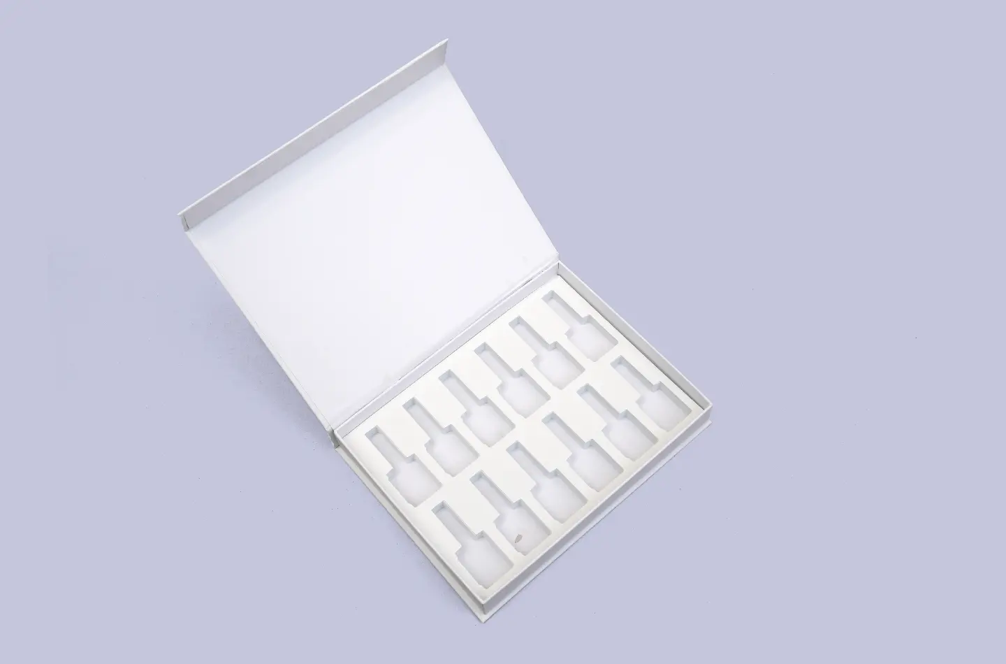 premium custom white cosmetics book-style box EVA insert pink logo fully open front view