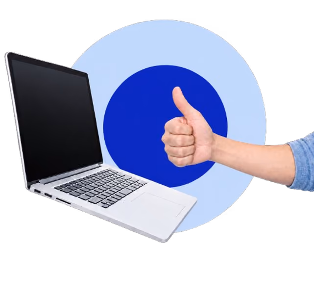 Hand giving a thumbs up beside a laptop