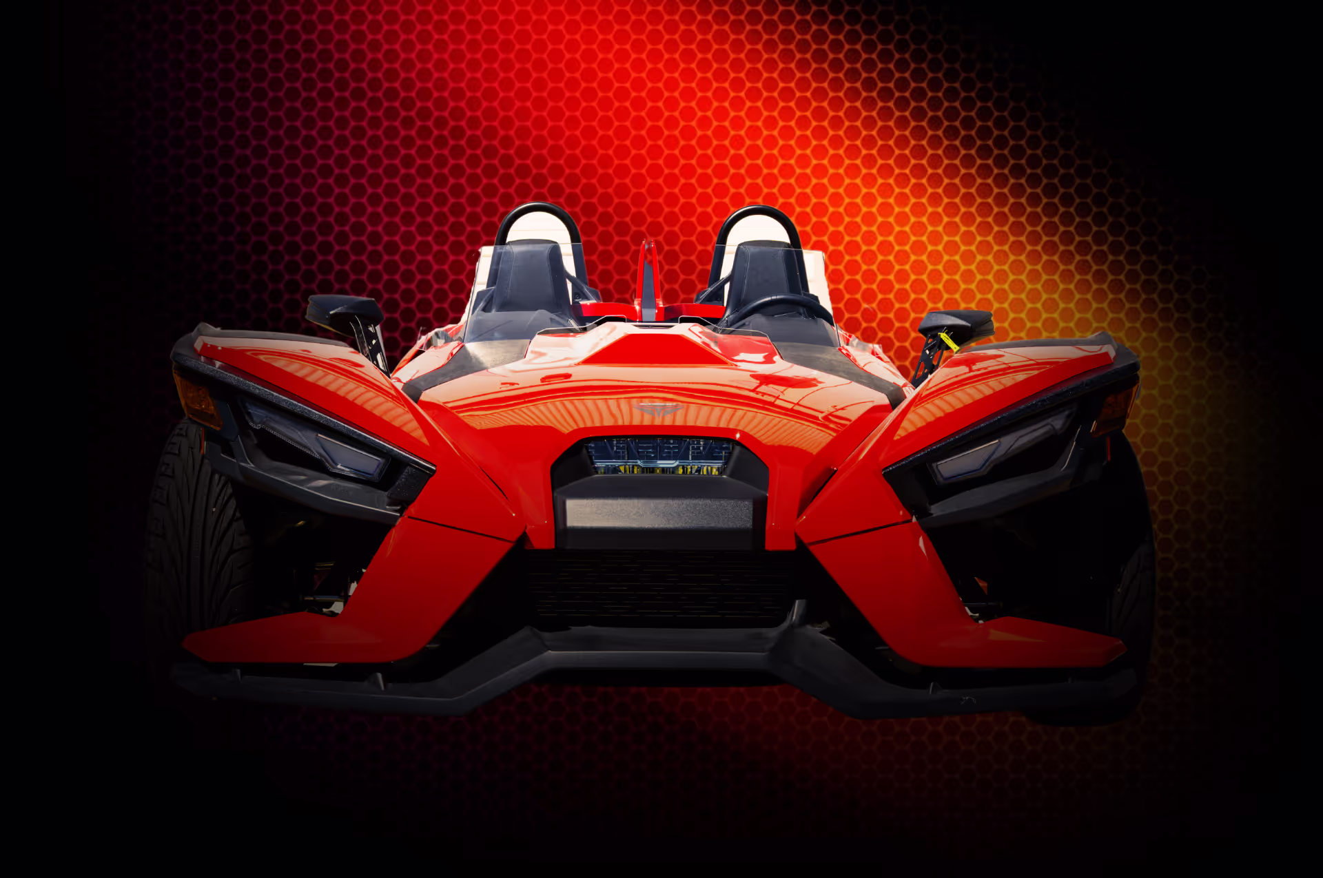 A beautifully displayed red Polaris Slingshot, available to rent in Houston