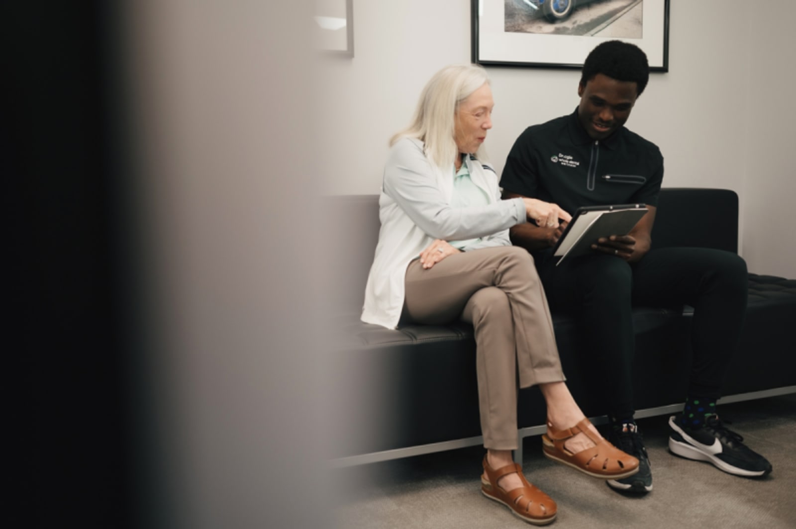 Patient and dentist discussing treatment options during consultation at Whole Dental Wellness.