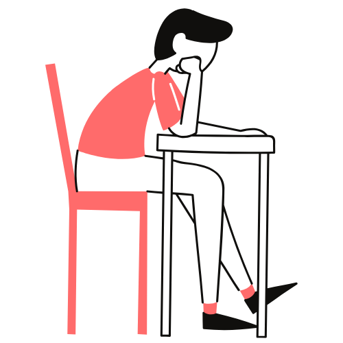 Une personnes est assise et accoudée sur une table, elle s'ennuie