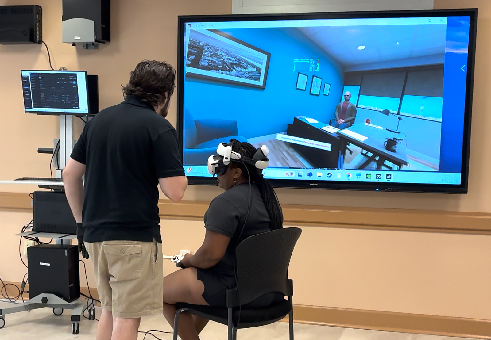 A student goes through onboarding before beginning a VR nursing simulation