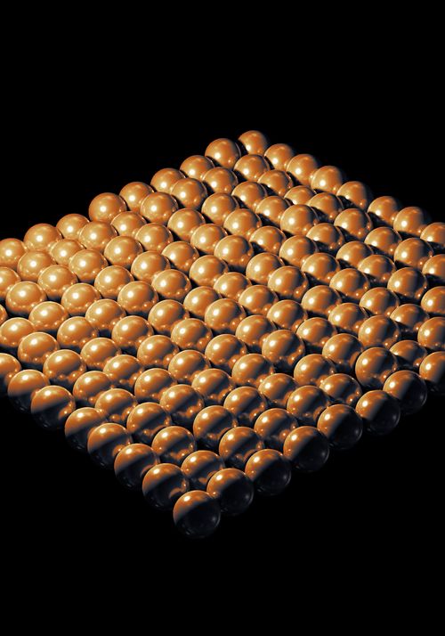 Grid of shiny metallic brown spheres arranged in a square pattern on a black background.