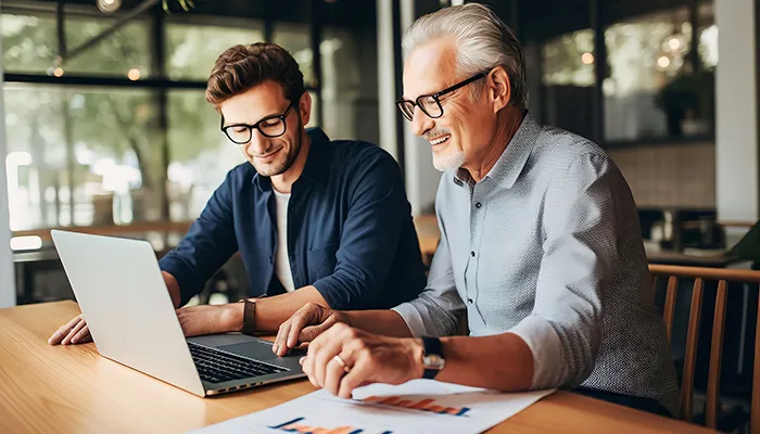 Finance adviser reviewing business funding options with a client