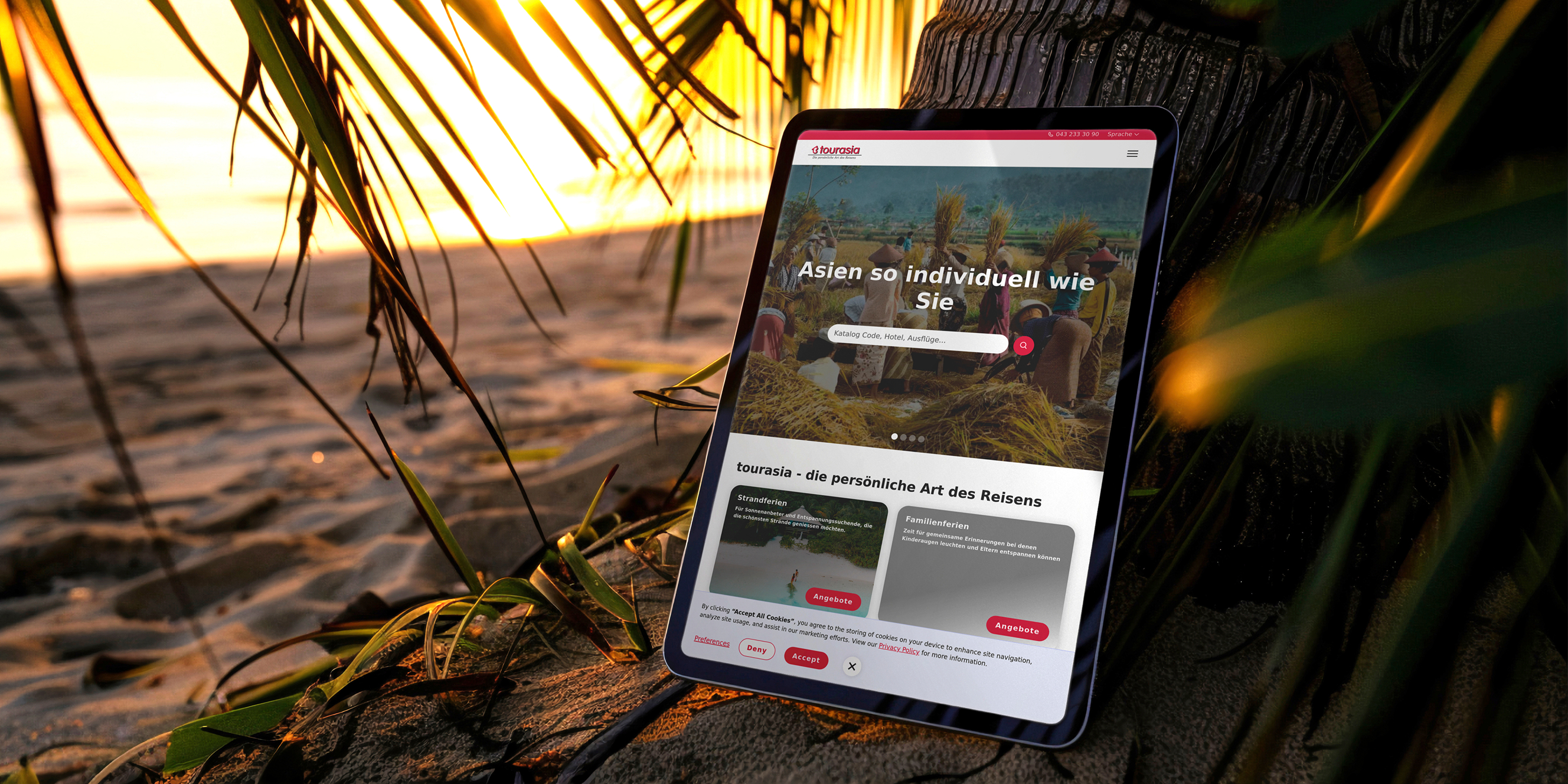 Tablet mockup showing the Tourasia website.