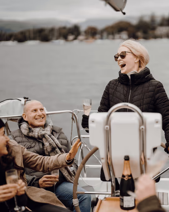 Retreat members enjoying time on a sail boat at Lake Windermere