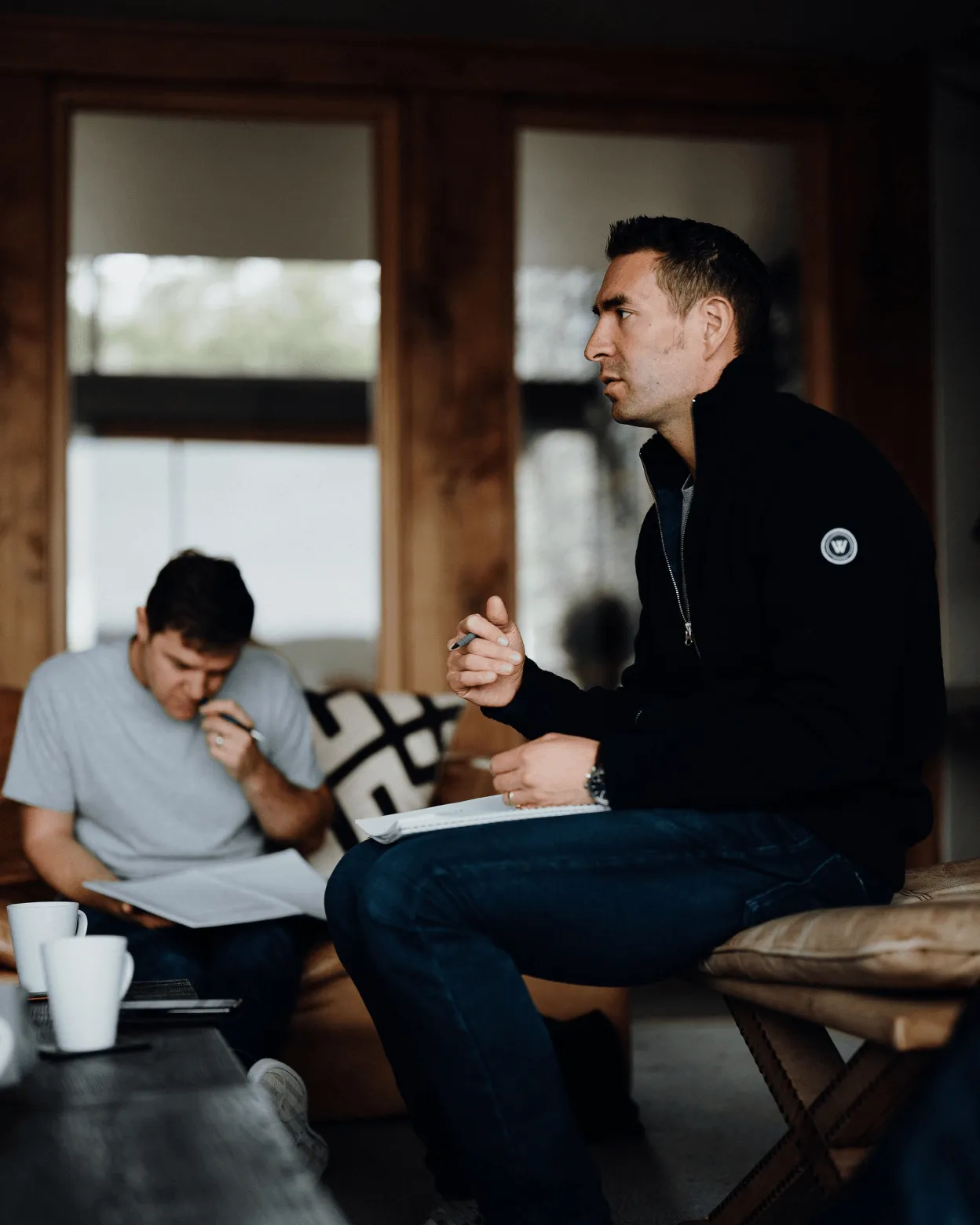 Tsen speaking with retreat members in Lake Windermere property