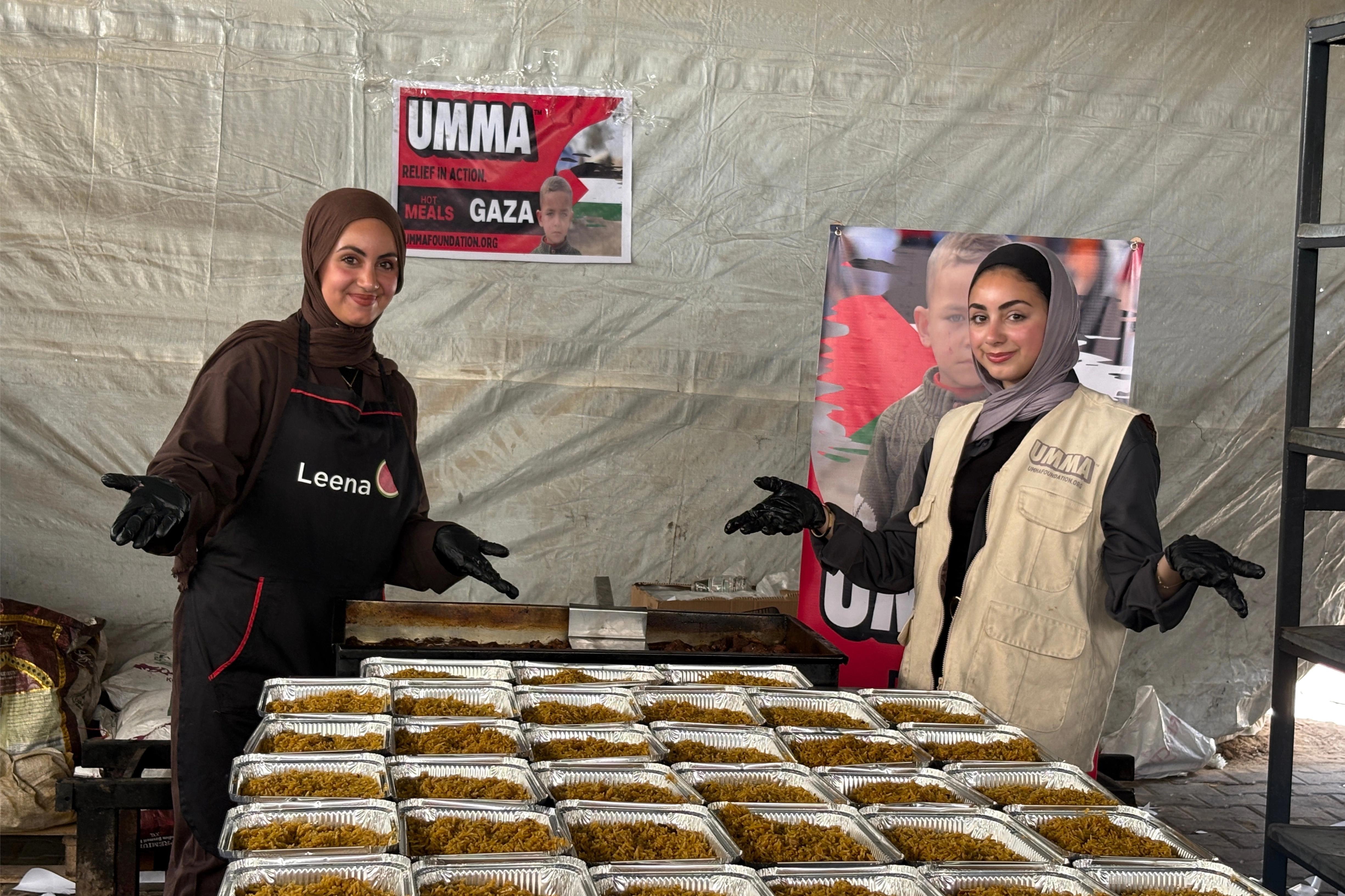 UMMA hot meals in Gaza, burgers for children and traditional Qidra for families