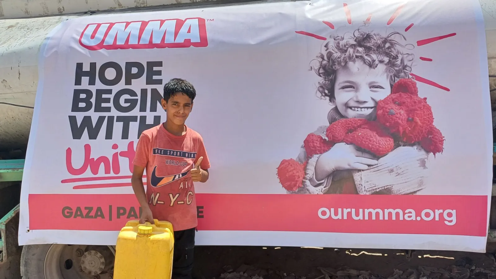 Gaza boy with Umma water aid