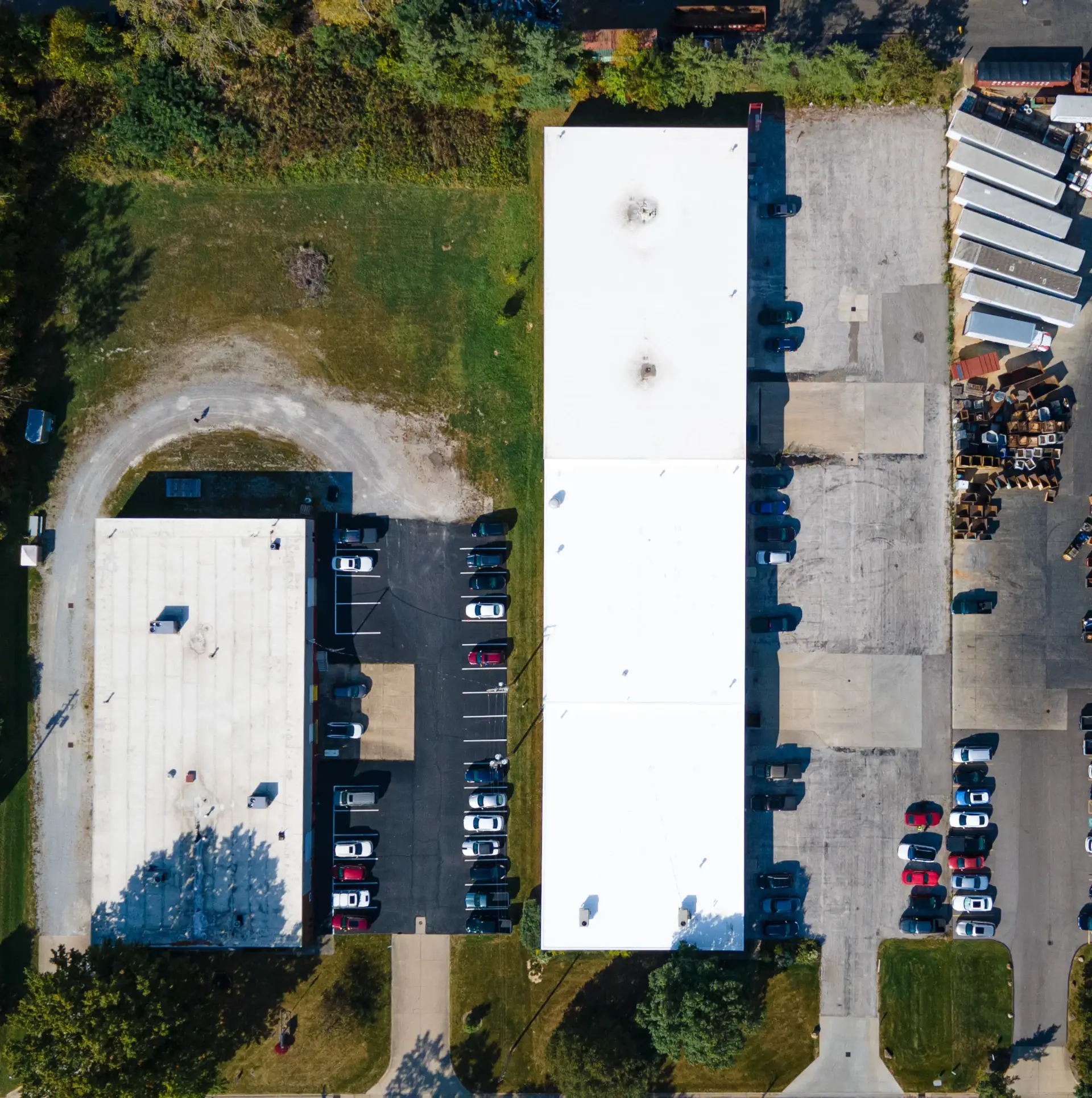 top down of white flat roof commercial building