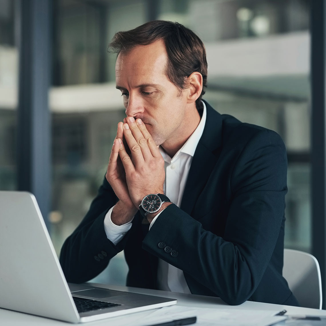 Male attorney stressed at work