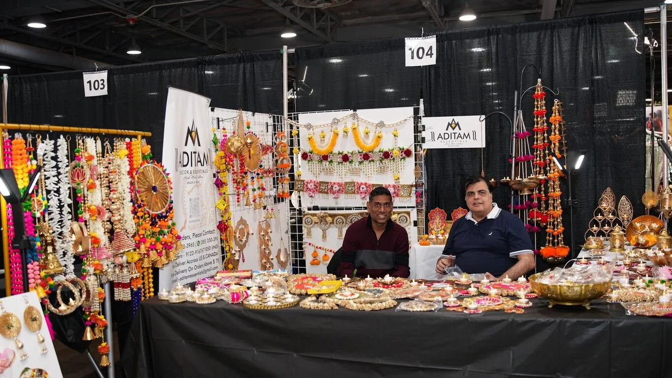 Vendor stalls with festive jewelry and décor at a temple Diwali fair