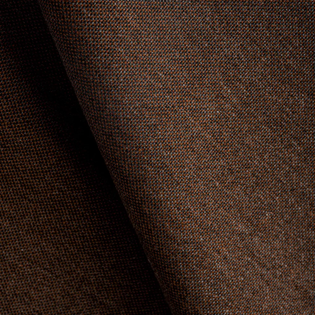 Tissu d'extérieur en toile texturée Sunbrella Natte : élégant, durable et résistant à la décoloration, offrant une texture tissée sophistiquée pour les applications extérieures et intérieures.