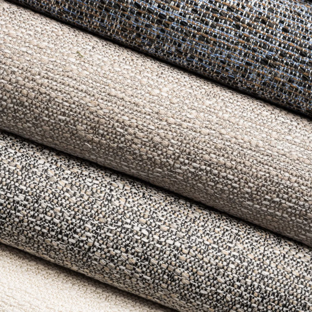Tissu d'extérieur Sunbrella Tundra, qui rappelle une texture tissée à la main, durable, résistant à la décoloration et parfait pour ajouter une élégance naturelle aux espaces extérieurs.